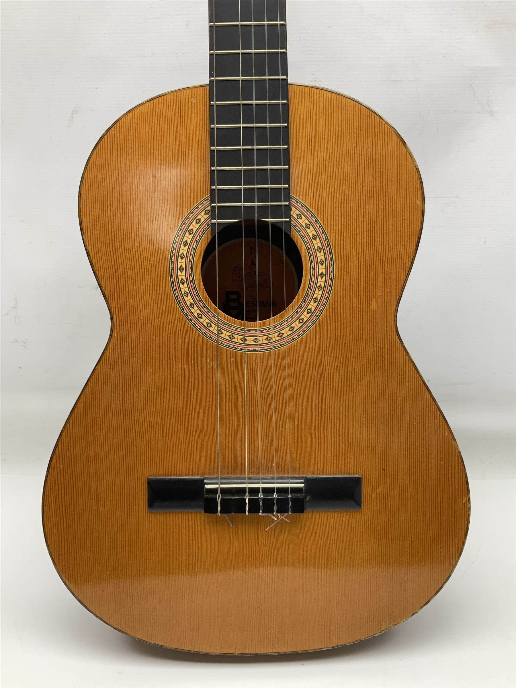 Spanish BM acoustic guitar with mahogany back and sides and spruce top L101cm; in cello carrying case; Roland foot pedal and two Yamaha foot pedals; tin D# organ pipe; folding music stand etc