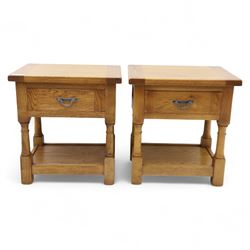 Old Charm - ‘Chatsworth’ pair of light oak lamp tables, each with moulded rectangular top, single drawer and metal drop handle, raised on turned supports joined by undertier shelves