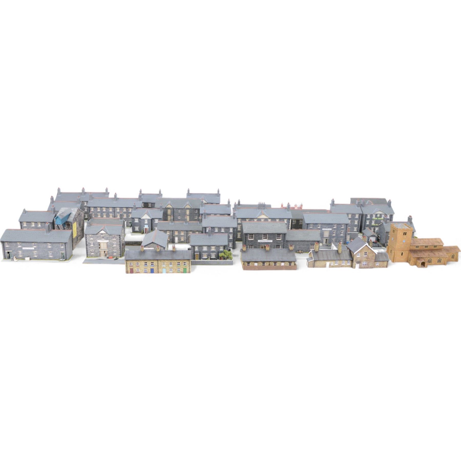 Thirty 00 gauge model railway trackside buildings, six by Martin's Models York including church and terraced houses and twenty-four kit-built examples all grey stone effect houses and farm buildings