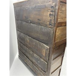18th century and later oak livery cupboard, enclosed by two fielded panel doors with iron hinges, panelled sides and boarded back, stile supports