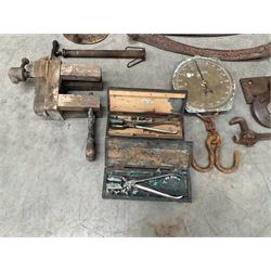 Large quantity of vintage hand tools including scales, scythes, saws etc
