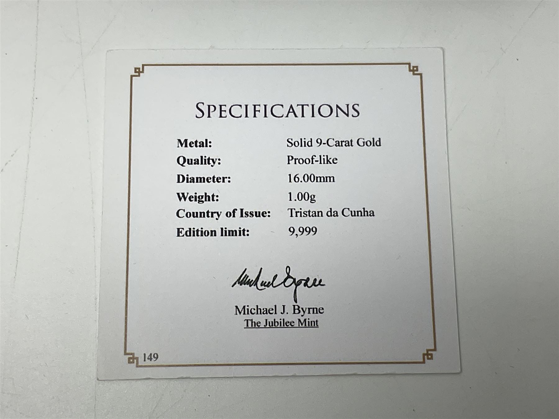 Queen Elizabeth II 2000 'The Queen Mother' silver proof five pound coin, 2000 'Millennium' silver proof five pounds, 2007 'Scouts' silver proof fifty pence, Tristan Da Cunha 2014 9ct gold 1 gram gold one crown coin, all cased with certificates and a 'Prince Charles 60th Birthday Commemorative Coin Cover' containing a 2008 silver proof five pound coin in folder (5)