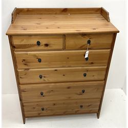 Pine chest, chest, raised shaped back, two short and four long graduating drawers