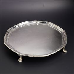 Silver circular salver with pie crust border on shaped supports D25cm London 2010 
