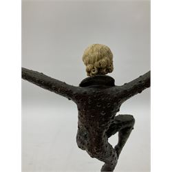 After Demetre Chiparus (1886-1947), Art Deco style figure modelled after The Dancer of Kapurthala, with ivorine head and handles, signed D H Chiparus, raised upon an onyx plinth with curved supports and rectangular base, overall H32cm