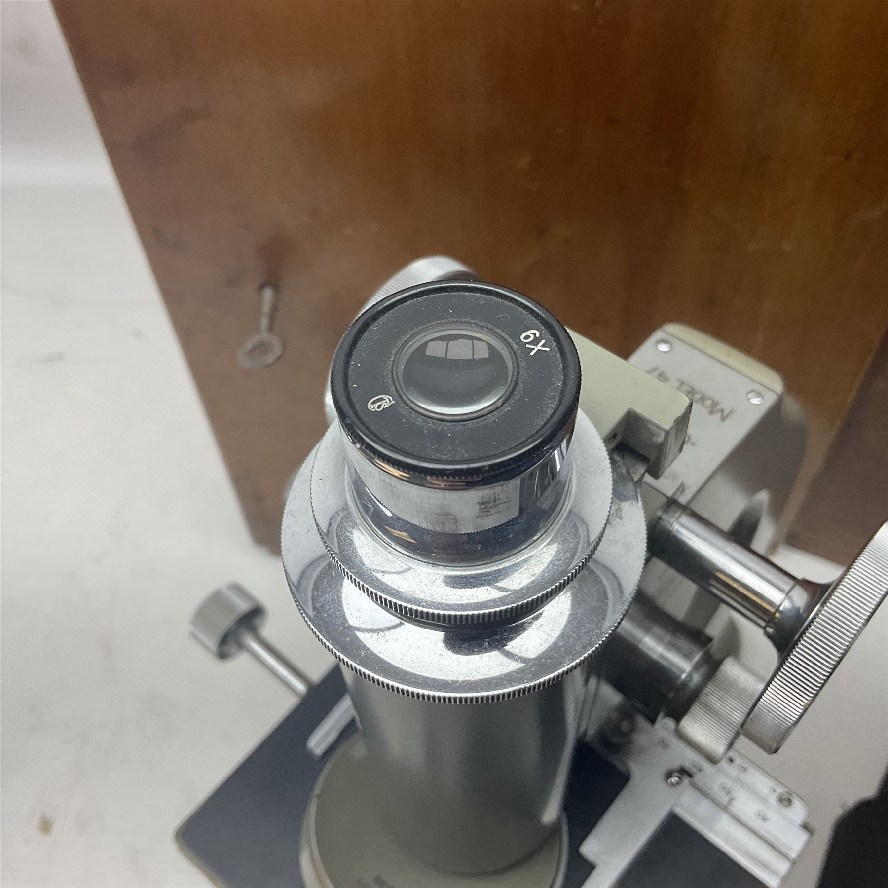 Four microscopes, including Cooke, Troughton & Simms no M467926, W Watson & Sons no 114758, W & J George & Beck Ltd no 36649 and one other 