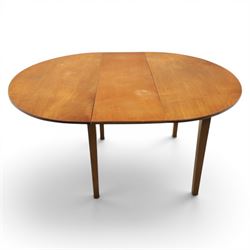 Mid 20th century teak extending dining table, together with eight teak chairs with green leather seats, extends to 154cm