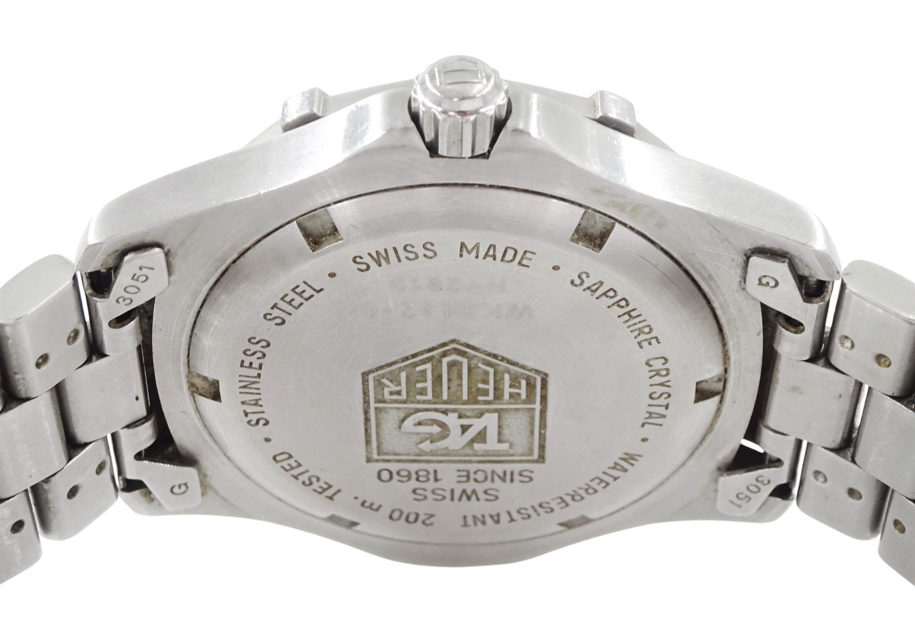 Tag Heuer gentleman's stainless steel quartz wristwatch, Ref. WK1112-0, silvered dial with baton hour markers and date aperture, on original stainless steel bracelet, with fold-over clasp