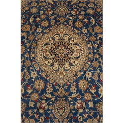  Persian Nain beige and blue ground rug, central medallion, interlaced floral field, 305cm x 200cm  