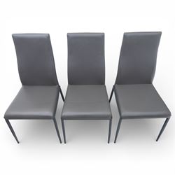 Modern composite marble effect dining table, rectangular top with simulated veining supported on a block pedestal base, accompanied by six matching dining chairs with padded seats and backs in grey upholstery on slim metal legs