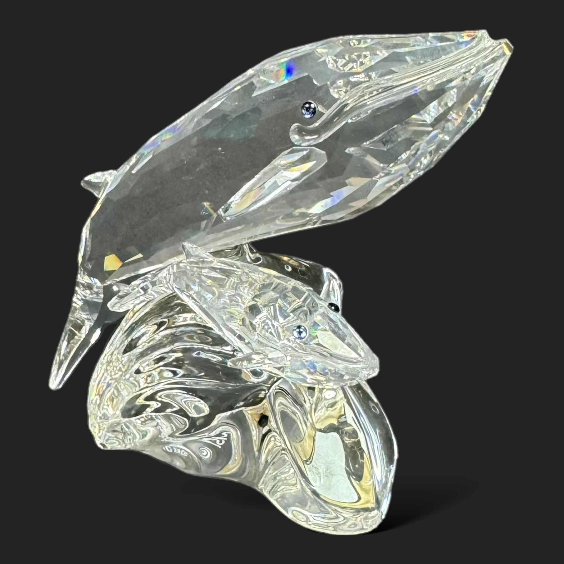 Three limited edition Swarovski Crystal figures, Care For Me, Save Me and Lead Me, all boxed with certificates 