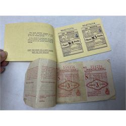 Gold plated leaping Jaguar car mascot, no.7'24265'3WB L12.5cm; three AA car badges and Veteran Motorists car badge; and quantity of 1950s fuel and general ration books