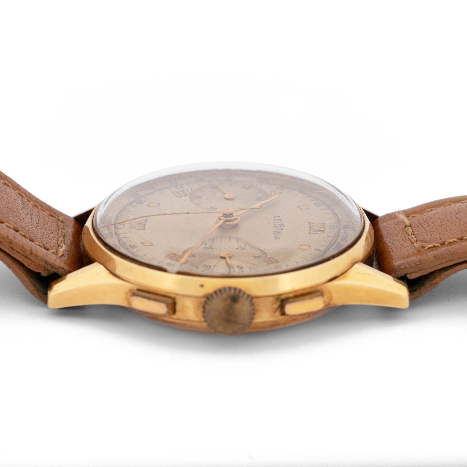 Delbana gentleman's 18ct gold manual wind chronograph wristwatch, circa 1950, dial with square and Arabic hour markers, subsidiary dials at 3 and 9 for seconds and 30 minute recording, stamped 18K 750 with Helvetia hallmark, on brown leather strap
