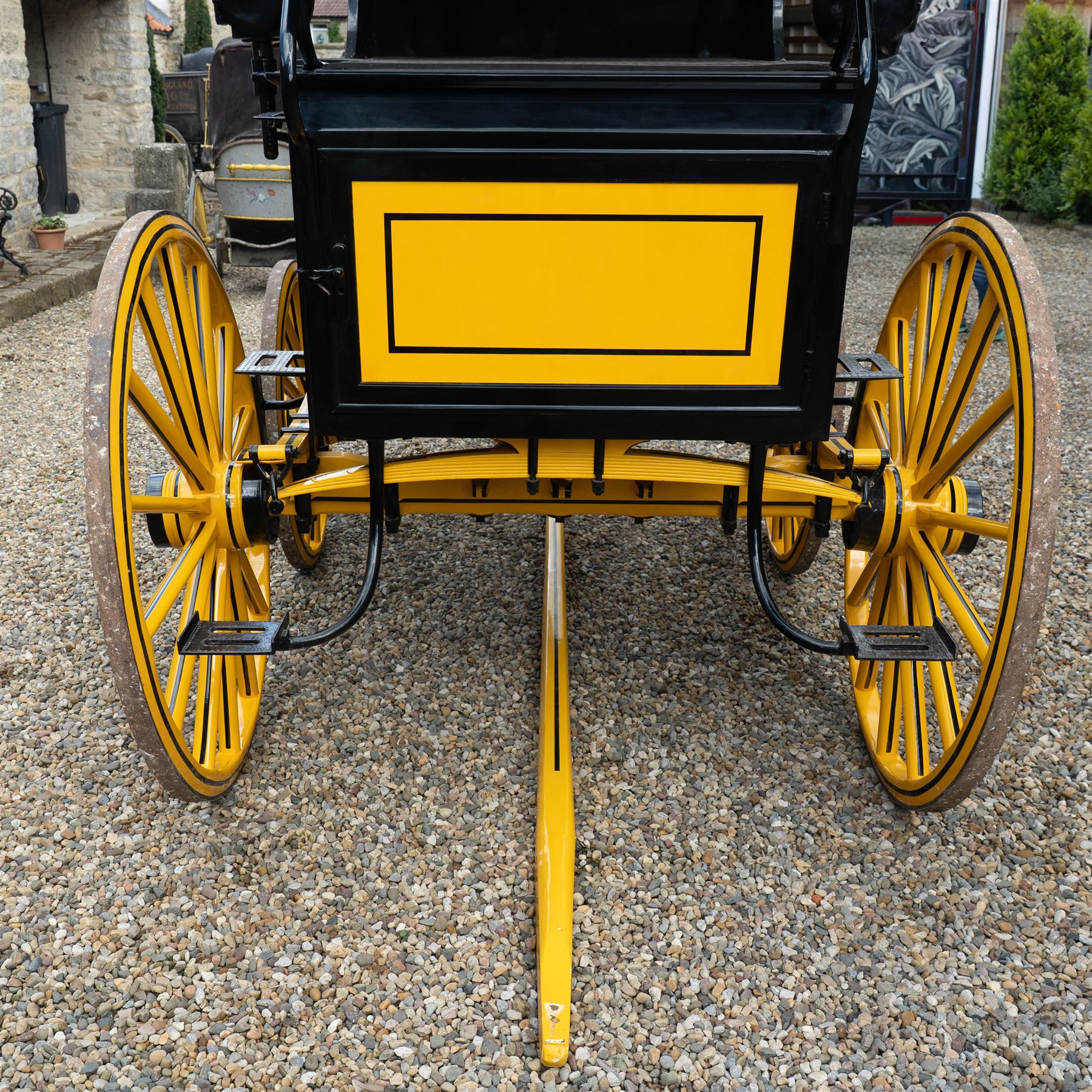 Roof Seat Break by Shanks of London

A roof seat break by Shanks of London built on a perch in black and yellow livery, the body fitted with an elevated driver's box seat, elevated rear groom's seat and central passenger compartment. The carriage is mounted on wooden spoked wheels with leaf spring suspension and is equipped with louvred underbody storage compartments, carriage lamp brackets (lamps next lot), folding access steps and a pole for driving with a pair or team of horses. The wheel hubs are stamped 