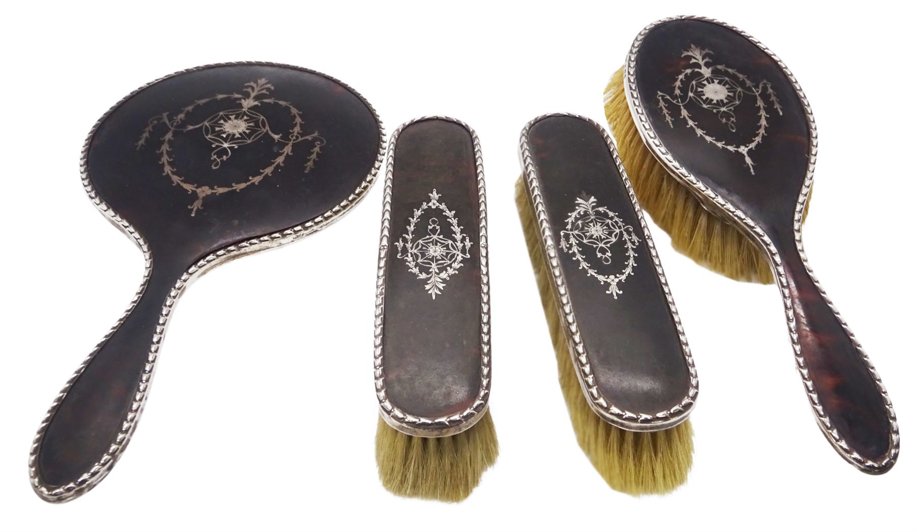 Early 20th century silver and tortoiseshell mounted four piece dressing
