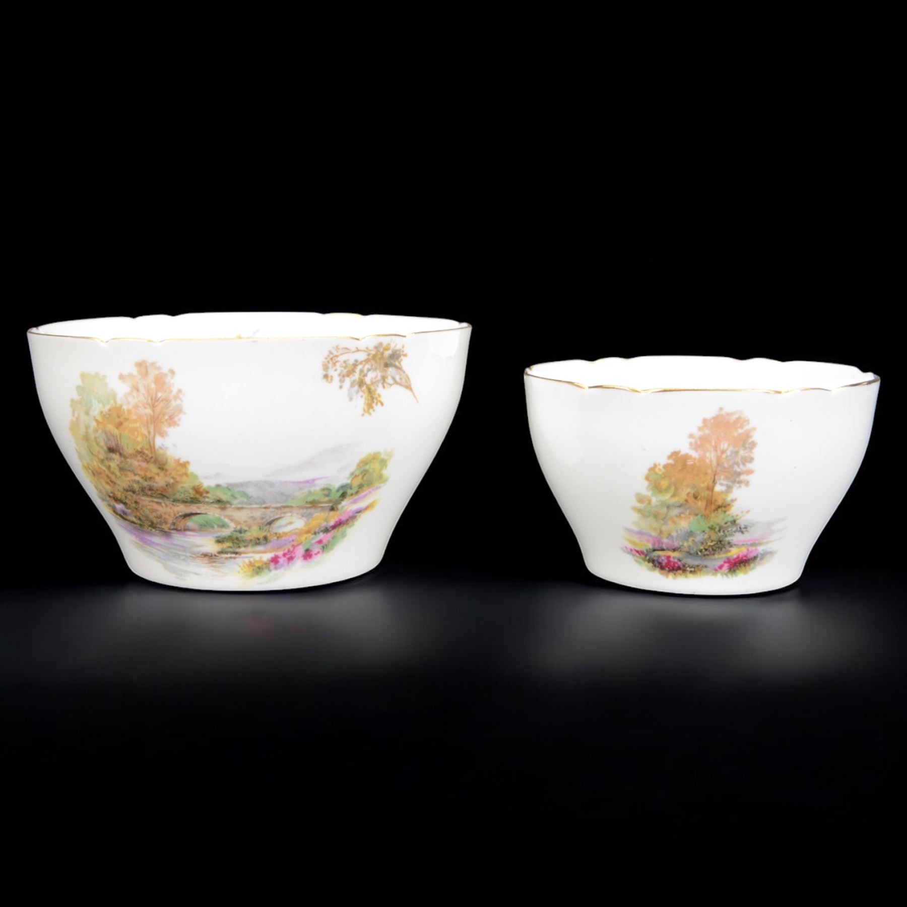 Shelley Heather pattern coffee service for six, including coffee pot, milk jug, two open sucrier, coffee cups and saucers, tea cups and saucers, etc