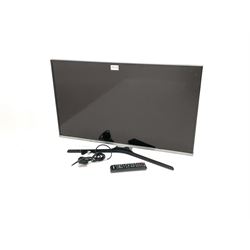 Samsung UE32J5100AK television with remote control