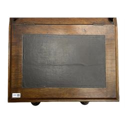 Victorian walnut Davenport, hinged sloping top with inset leather writing surface, enclosing satinwood lined interior with two drawers over faux drawer, fitted with inkwell drawer and pen compartment to the side over four drawers with an opposing false set, raised on spiral turned supports united by a shaped platform base