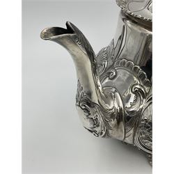 Victorian silver three piece tea service, comprising teapot, twin handled open sucrier, and milk jug, each of bellied form with acanthus capped scroll handles, the sides embossed with alternating scroll edged vacant panels and panels containing a pair of birds, upon four palmette feet, the teapot with ivory insulators to handle, and bird finial to the hinged domed cover, hallmarked William Hunter & Son, London 1861, teapot H19cm, including handles sucrier H13.5cm, including handle milk jug H12cm

This item has been registered for sale under Section 10 of the APHA Ivory Act