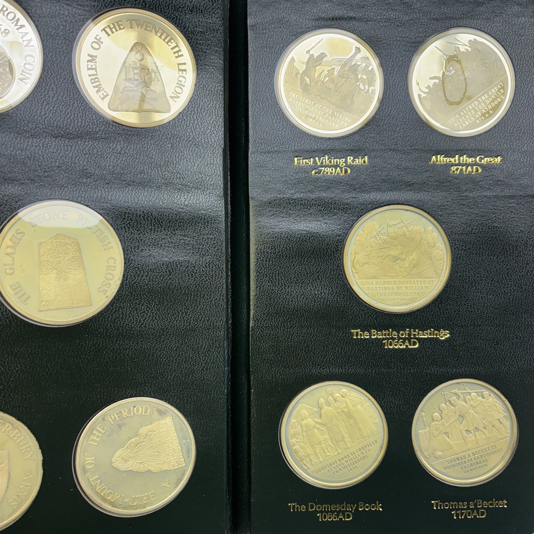 Limited Edition Danbury Mint 'History of the English Speaking Peoples' complete set of fifty silver medallions, each depicting historical figures and scenes from Julius Caesar Lands 55BC to Second World War 1939AD, contained within leatherette folder with personalised presentation to cover and interior, no. 2780/7500