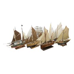Eight model ships or boats including fis