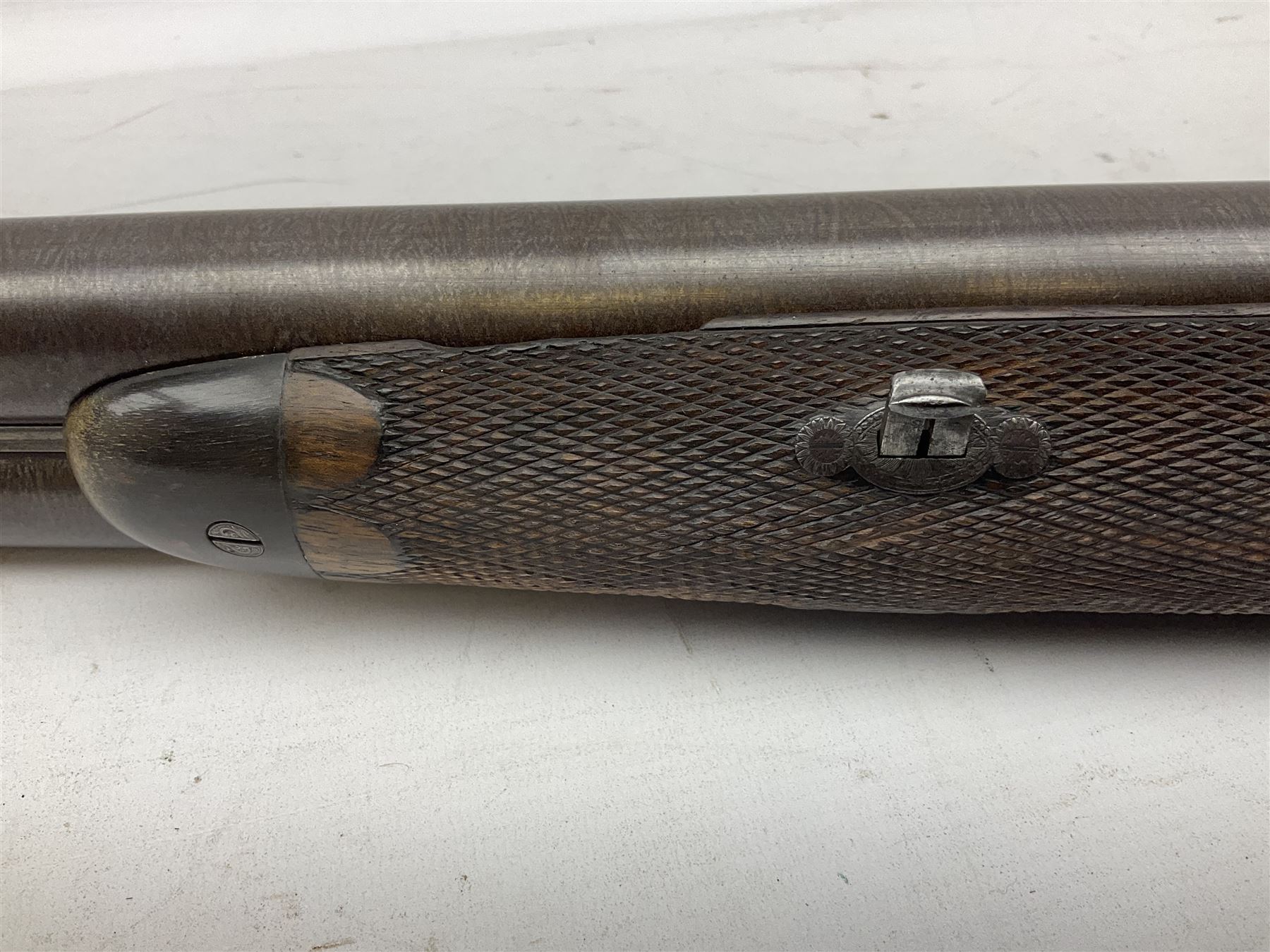 19th century John Jefferson of Scarborough 6-bore (modern 4-bore) double barrel side-by-side percussion gun, with 81cm stub twist damascus barrels (no provision for ramrod), well figured walnut stock with fine chequered grip and fore-end with horn tip and steel butt plate with long tang, well engraved lock and hammers with half-cock safeties on both sides, barrel sling swivel but rear sling swivel removed and replaced with silver escutcheon, London proofmarks, NVN, L128cm