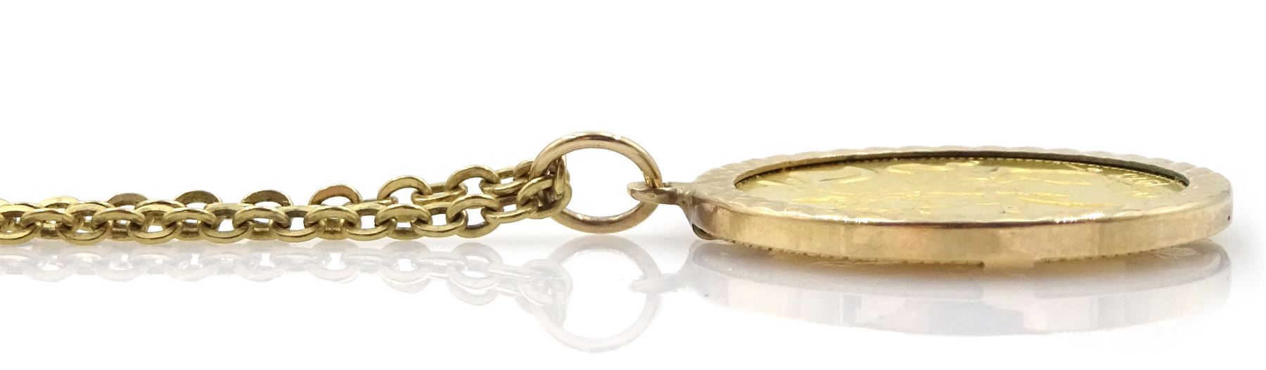 Elizabeth II 1973 Isle of Man gold full sovereign, loose mounted in gold pendant on gold necklace, both 9ct