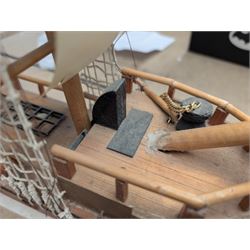 Wooden model ship 'Mayflower', together with a similar smaller example, largest H56cm