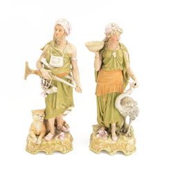 Pair of Royal Dux spill vase figures, modelled as a huntsman and water carriers, each with...