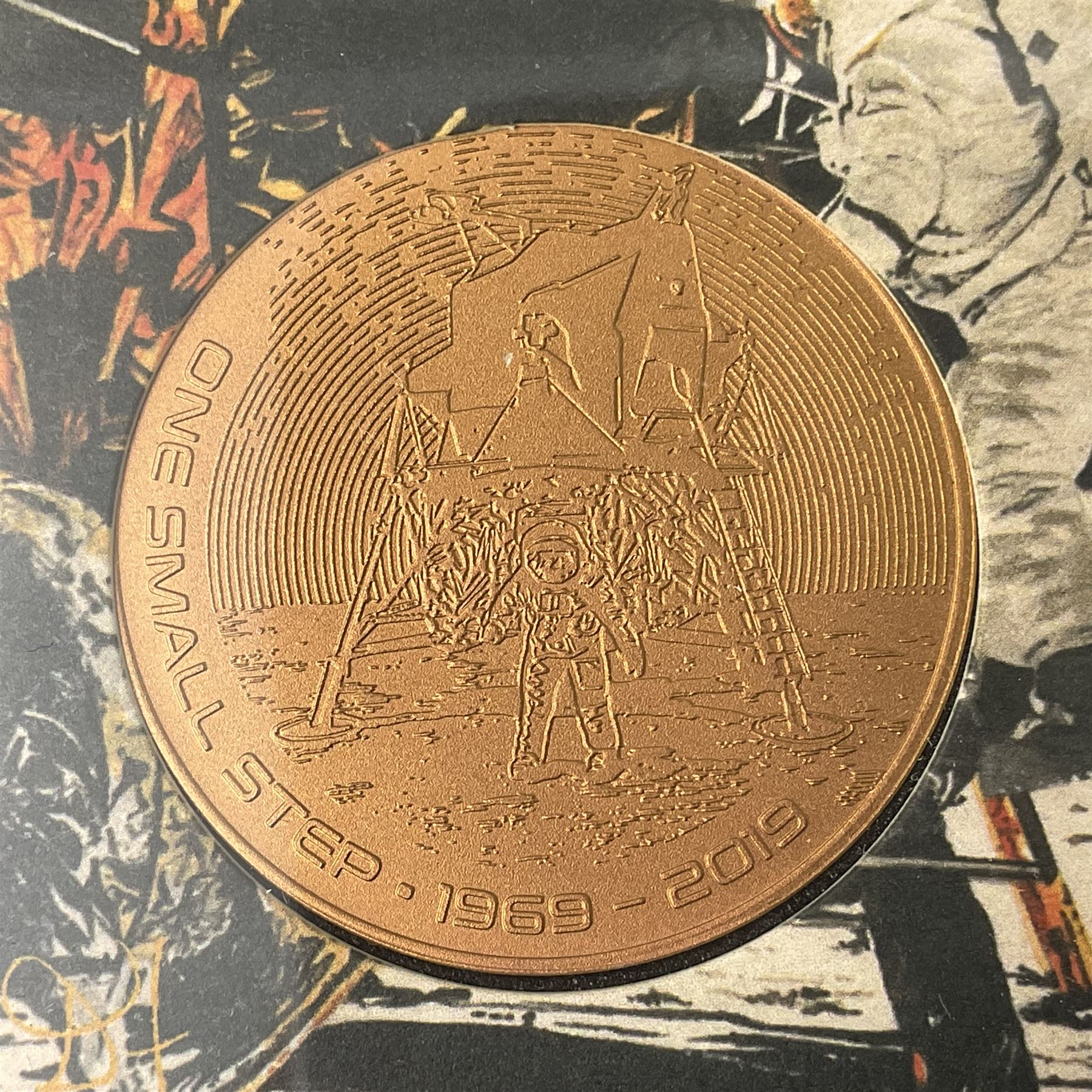 Queen Elizabeth II Bailiwick of Guernsey 2019 'The Titanium Moonlanding' fifty pence three coin set, comprising 'Green', 'Orange' and 'Blue' titanium coins, in capsules and case with certificate