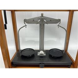 Griffin & George set of laboratory scales in fully glazed hardwood cabinet with rise-and-fall front door L44.5cm H40cm; with beech box of brass weights by Philip Harris & Co Ltd