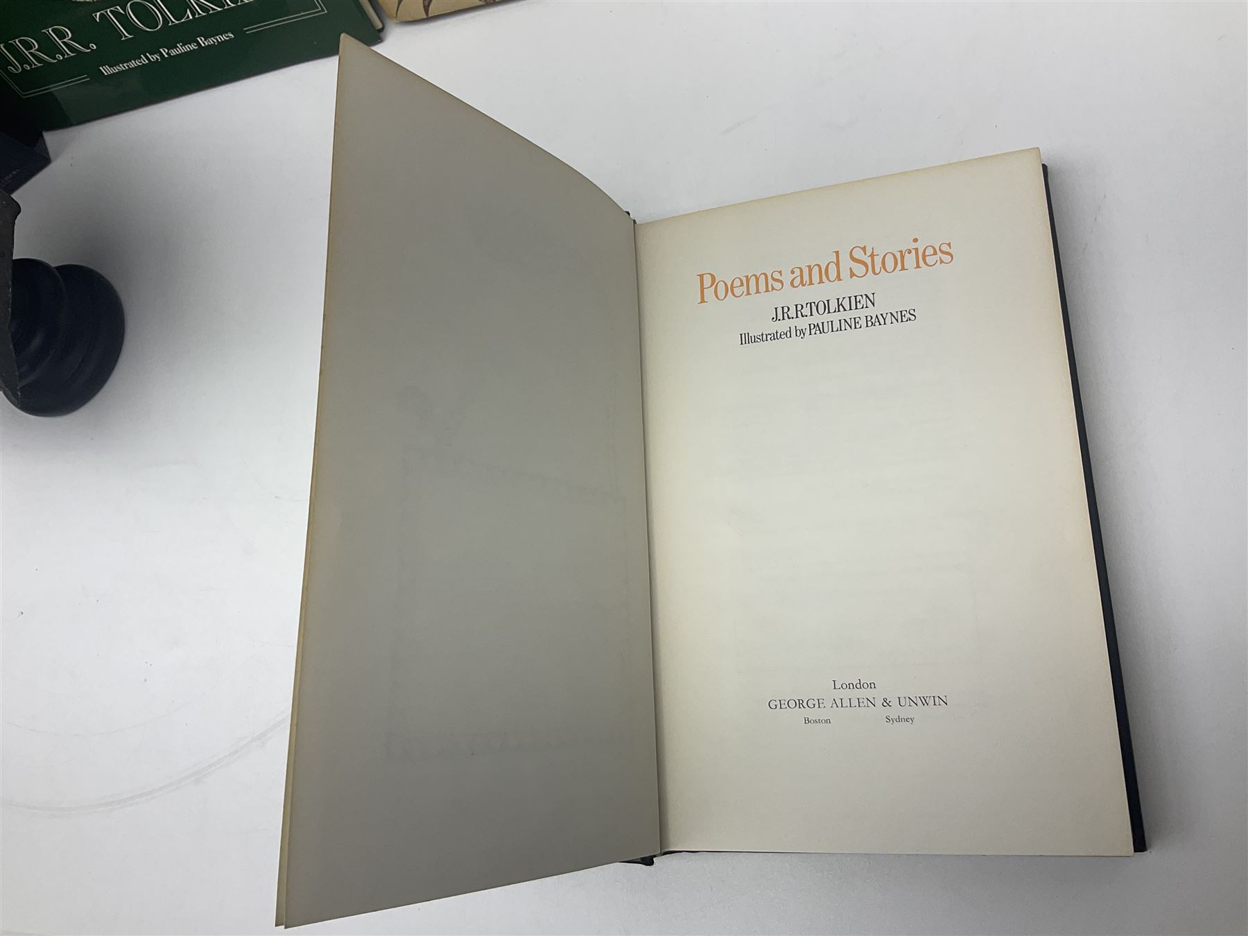 J.R.R. Tolkien ‘The Lord of the Rings’ Deluxe Edition seventh impression and ‘Poems and Stories’ pub. George Allen and Unwin 1979 and 1980 respectively, with Sideshow Weta FX ‘The Lord of the Rings The Return of the King’ limited edition 1/4 scale Helm of a Battle Troll in original box no. 613/2500, and other books and ephemera of related interest 