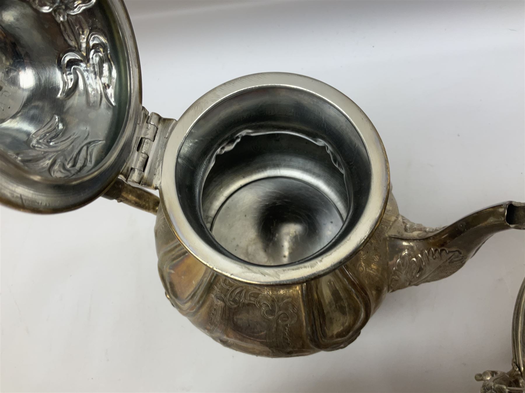 Twin handled silver plated bowl retailed by Harrods, together with two 19th century coffee pots, pewter milk jug and other metalware   