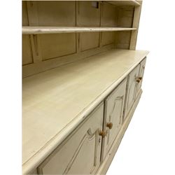 Large French style cream painted dresser, fitted with four cupboards and three tier plate rack