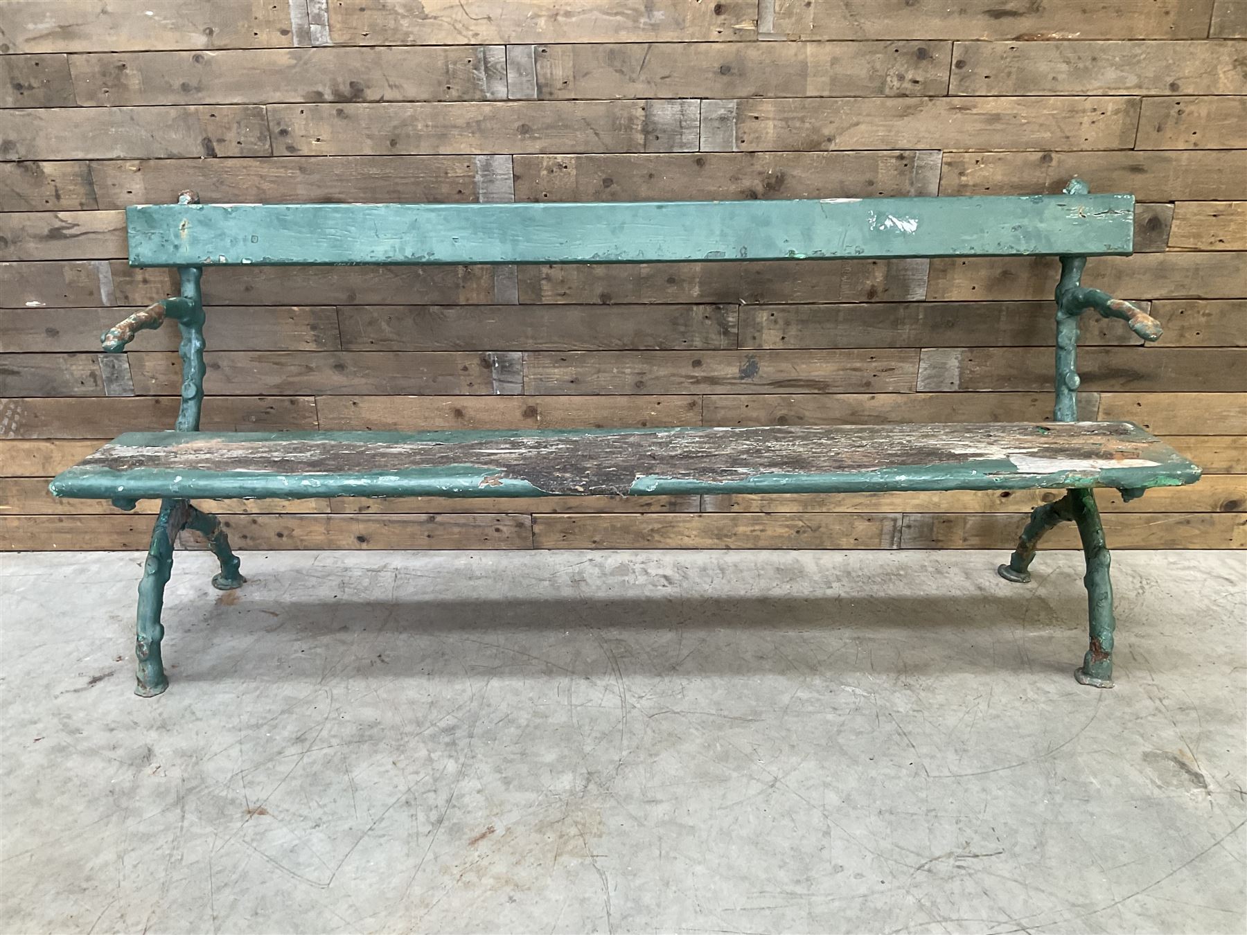 Early 20th century cast iron framed faux bois garden bench, timber seat and back rest