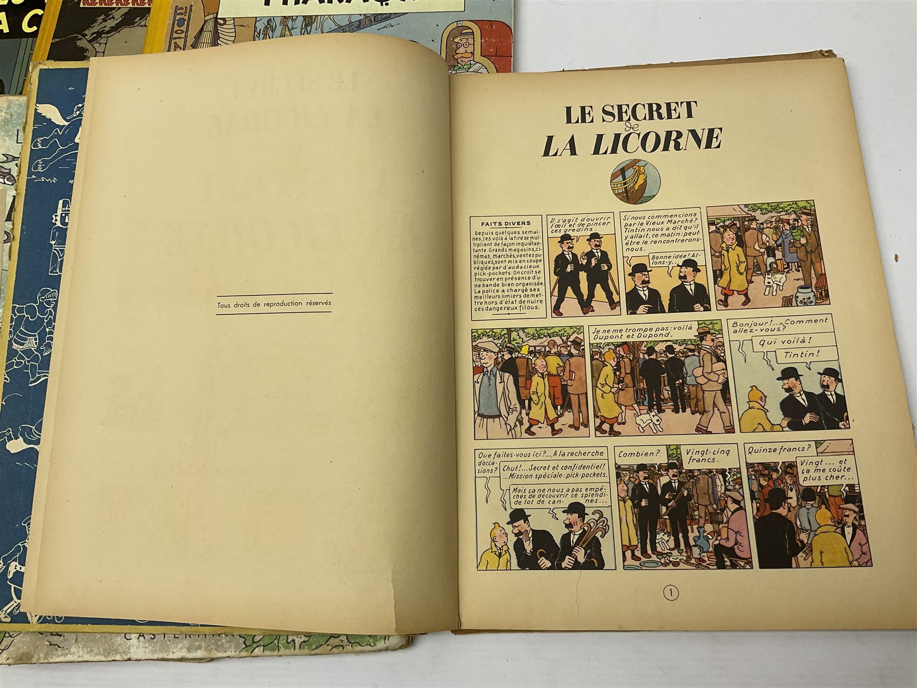 Twenty one first edition Herge, 'The Adventures of Tin Tin' books published by Casterman Bruxelles, with French text and coloured comic strip illustrations throughout; comprising Tintin Au Congo 1946, Tintin En Amerique 1946, Les Cigares du Pharaon 1955, Le Lotus Bleu 1946, L'Oreille Cassee 1943, L'ile Noire 1943, Le Sceptre d O'ttokar 1947, Le Crabe Aux Pinces D'or 1943, L'Etoile Mysterieuse 1942, Le Secret de la Licorne 1943, Le Tresors de Rackan Le Rouge 1945, Les 7 Boules de Cristal 1948, Le Temple du Soleil 1949, Au Pays de L'Or Noir 1950, Objectif Lune 1953, On a Marche sur la Lune 1954, L'Affaire Tournesol 1956, Coke en Stock 1958, Tintin au Tibet 1960, Les Bijous de la Castafiore 1963 and Vol 714 Pour Sydney 1968
