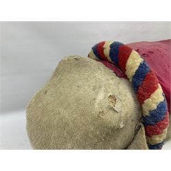 Early 20th century, plush straw filled pull along elephant, with red cloth and wooden wheels, H55cm 