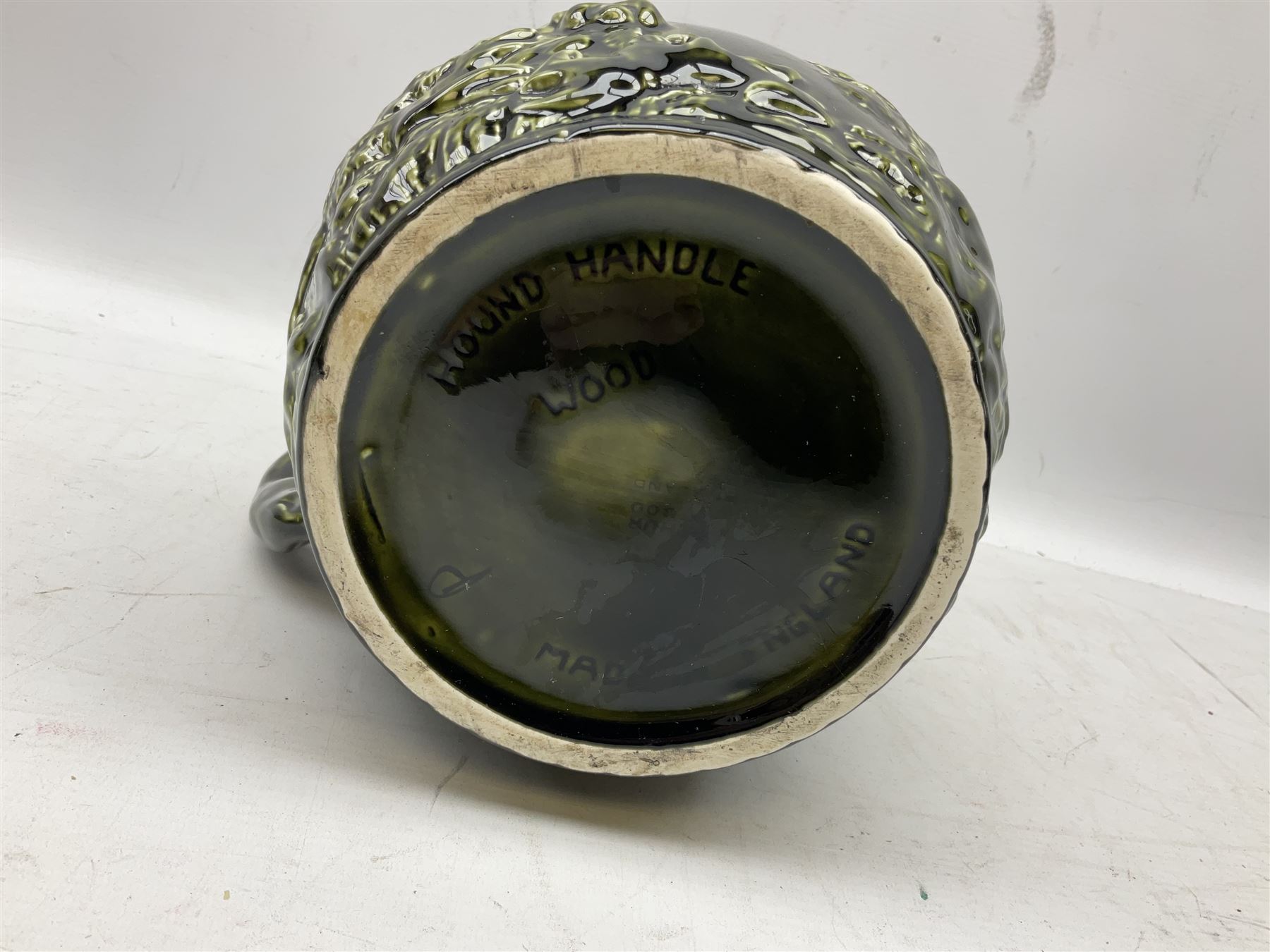 Three jardinières comprising West German Gerz example decorated in relief, Doulton Slaters example with frilled everted rim and a majolica example, and a further two Arthur Wood majolica jugs (5)