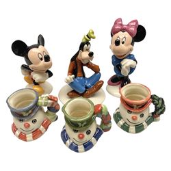 Three Royal Doulton The Mickey Mouse Collection figurines comprising Mickey Mouse MM1, Minnie Mouse MM2, and Goofy MM5, together withe three Royal Doulton limited edition miniature snowman character jugs comprising Christmas Stocking Snowman D7124, Christmas Cracker Snowman D7158 and Snowman D7062, all with original boxes 