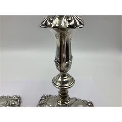 Pair of late Victorian silver mounted candlesticks, each of knopped and part fluted form, upon square stepped base with anthemions to each corner, with conforming sconces, hallmarked to removable sconces and foot, Thomas A Scott, Sheffield 1901, H25.2cm