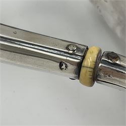 Victorian three-piece silver tea service, comprising teapot, twin handled open sucrier and milk jug, of oval form with shaped rim and C handles, each engraved with crests and bands of strapwork decoration, the milk jug and sucrier with gilt interiors, hallmarked Josiah Williams & Co, Exeter 1881, the teapot with ivory insulators and finial, all contained with a tooled leather, blue silk and velvet lined fitted case, retailed by West & Sun, Dublin 
This item has been registered for sale under Section 10 of the APHA Ivory Act