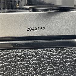 Nikon FE2 camera body, serial no. 2043167, with 'Nikon Zoom-NIKKOR 35-70mm 1:3.3-4.5' lens, serial no 3006624 and Nikon MD-12 Motor Drive, serial no. 1679037