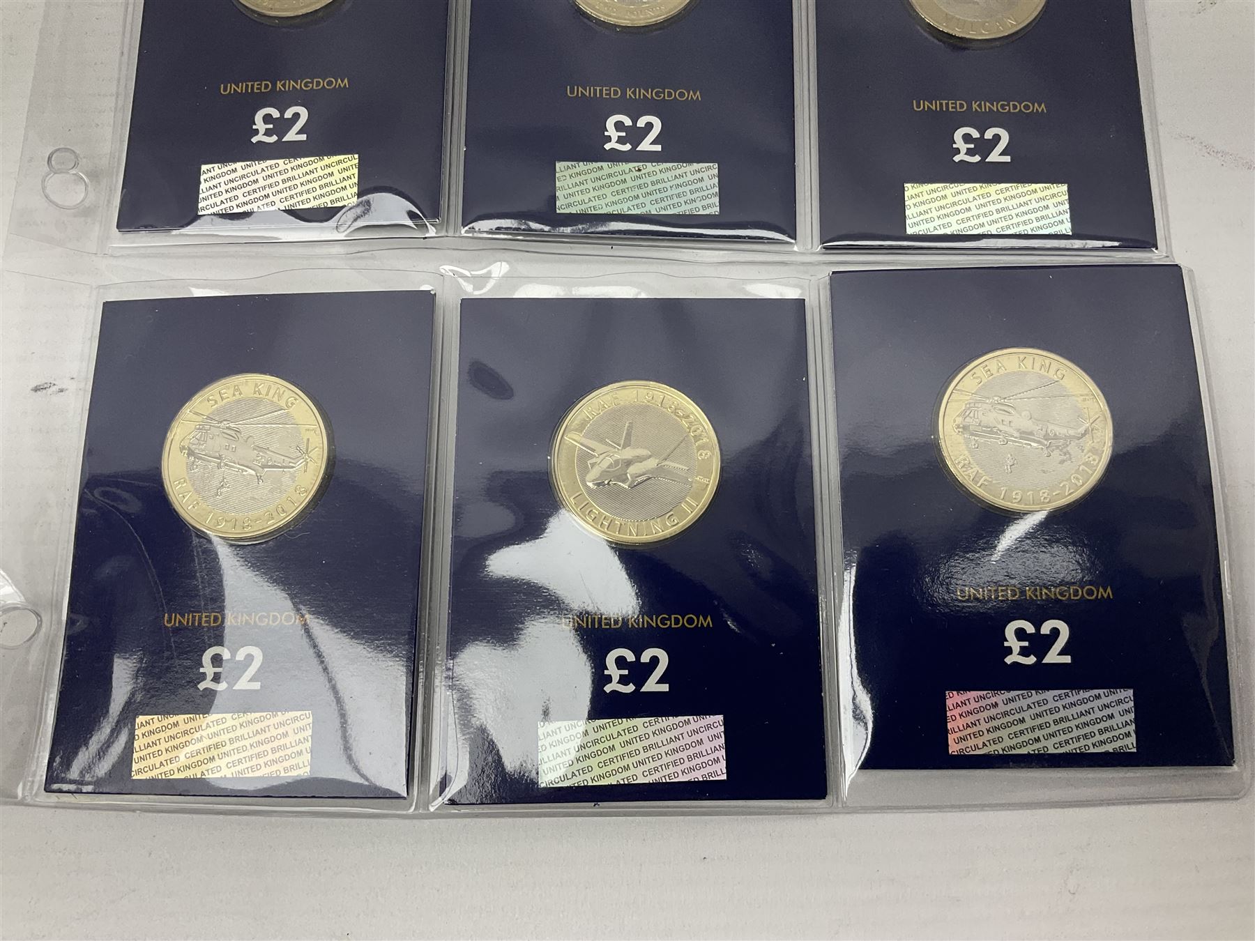 Mostly United Kingdom Queen Elizabeth II commemorative two pound  coins, including 2017 'Jane Austen', 2018 'Sea King', 2018 'Vulcan' etc face value of UK coins approximately 98 GBP