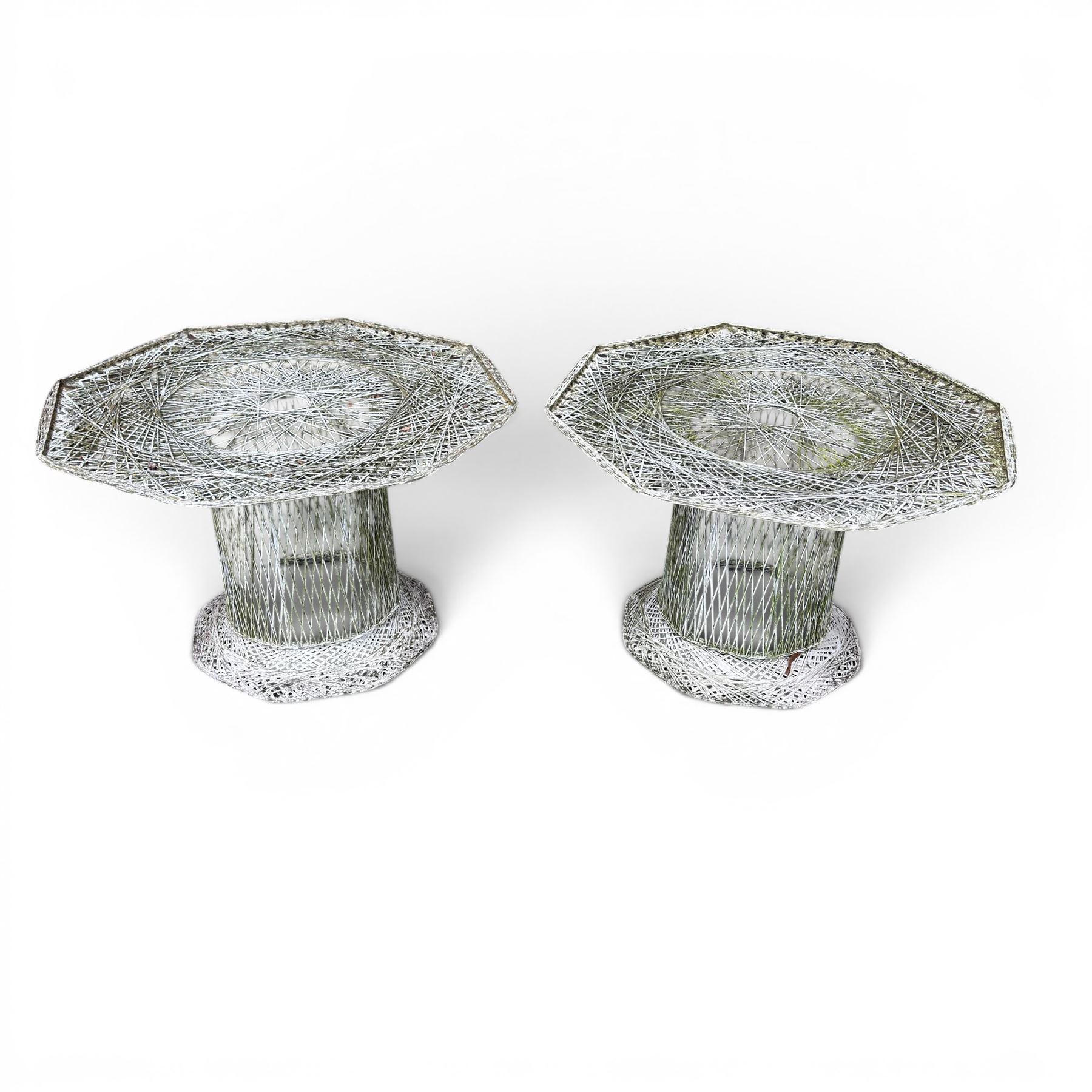 Two French early 20th century painted wicker octagonal garden tables, circular pedestals with parasol opening; with matching side table (3)