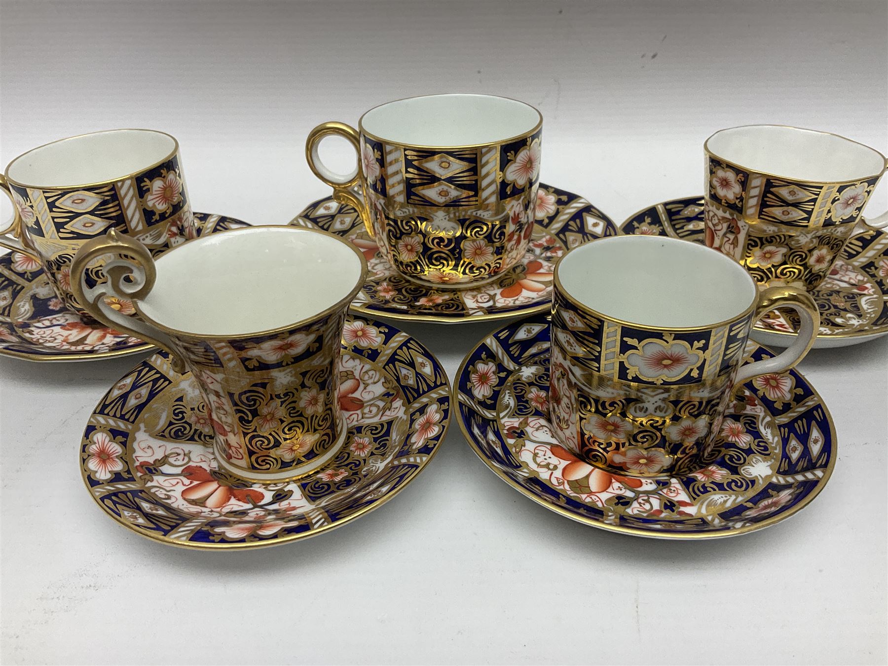 Six Royal Crown Derby cups and saucers all in imari pattern 2451, in various shapes  