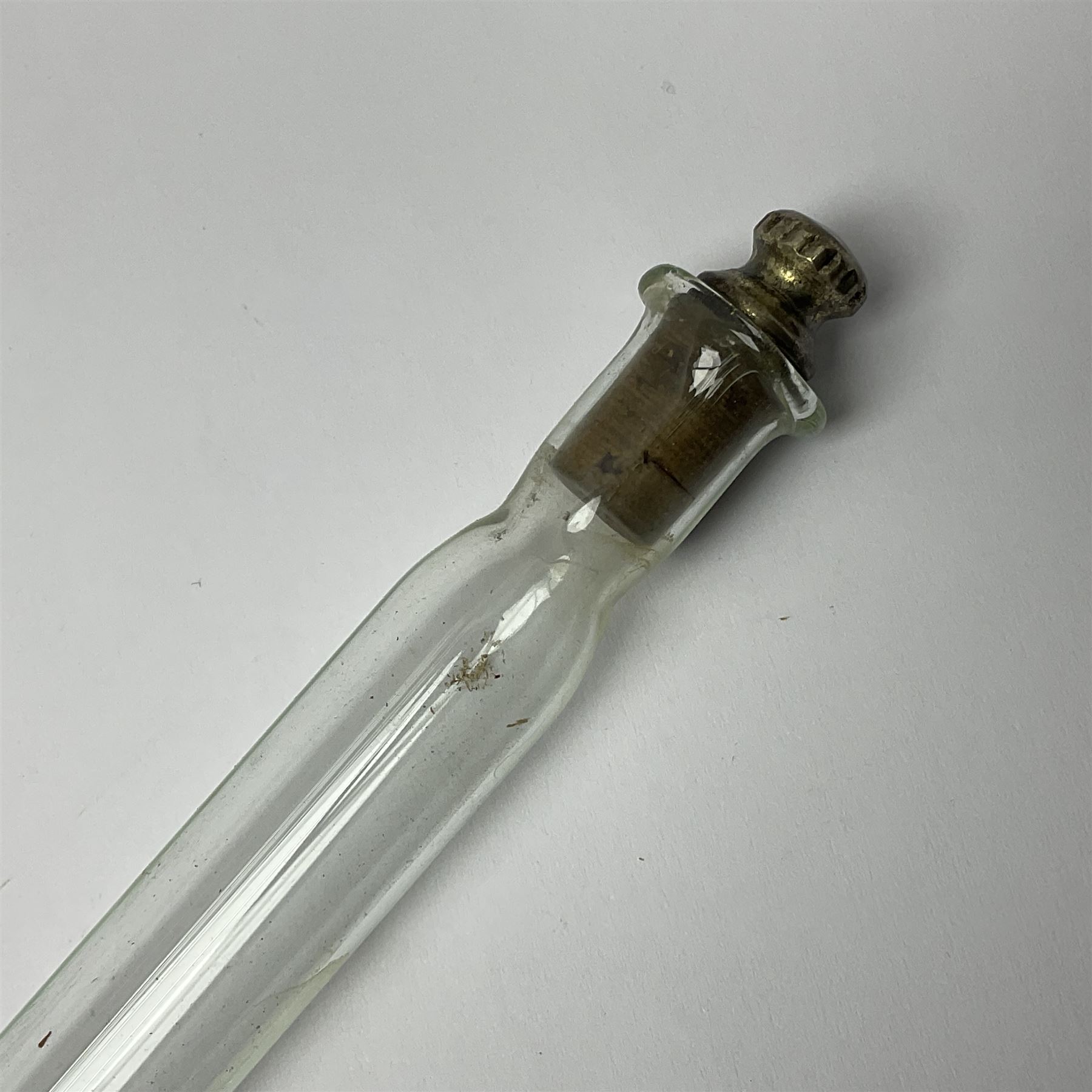 19th century malacca walking cane, the screw threaded domed cover opening to reveal vacant recess, above a further screw threaded opening revealing a removable glass vial with stopper, glass vial L41cm, cane L89.5cm