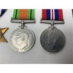 Representative display of WWII Campaign Stars and Medals comprising Burma Star, Italy Star, France & Germany Star, Defence Medal and War Medal 1939-1945; together with the corresponding group of miniatures; all with ribbons