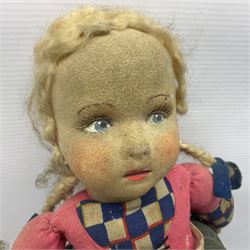 Farnell Alpha Toy soft toy of a Dutch girl, the pressed felt head with applied hair and painted features and overstuffed full length dress with apron and clogs; inoperative clockwork musical movement H31cm