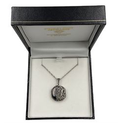 Silver shell and marcasite locket pendant, stamped 925 