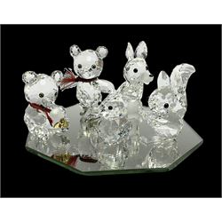 Swarovski crystal fox, squirrel, rabbit and two 'Kris Bear' Christmas figures on display mirror